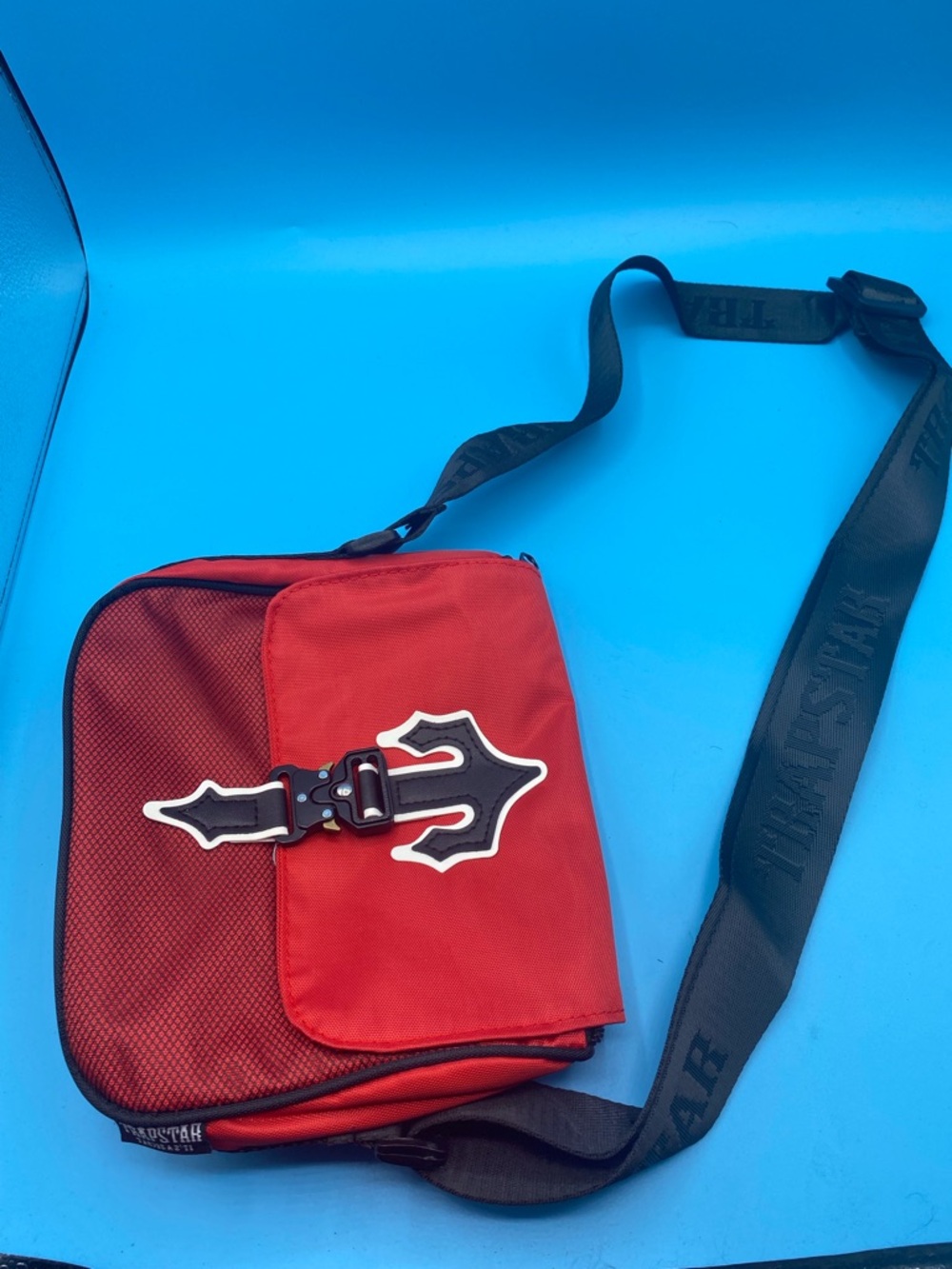 Trapstar Red Men's Messenger Bag with Black Strap and Decorative Buckle